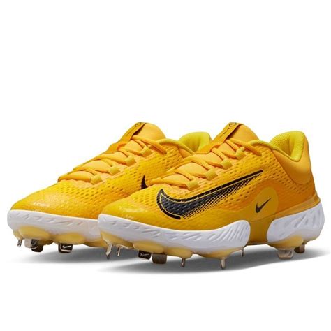 yellow Nike Huarache cleats